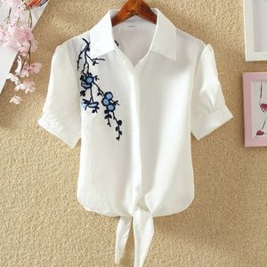women white blouse - blue flower embroidered